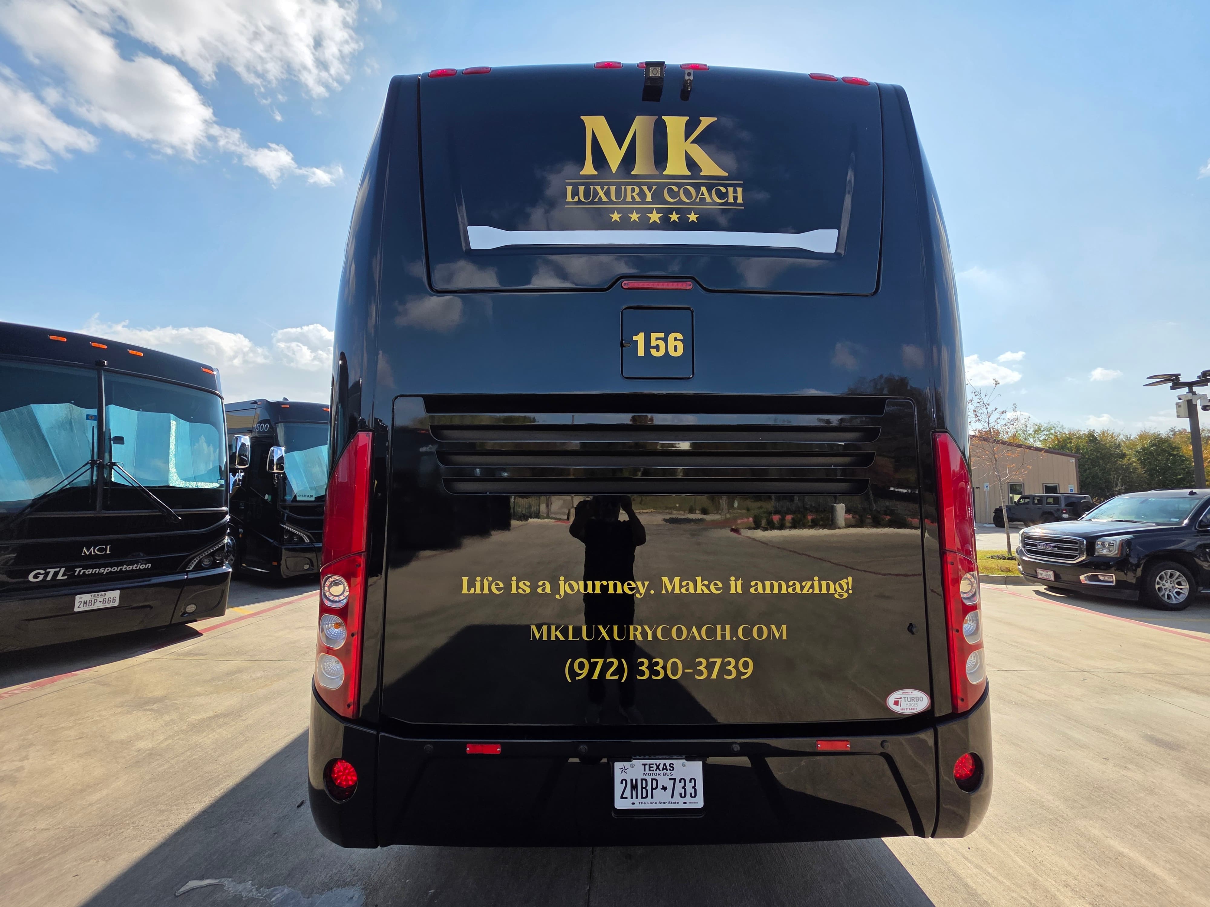 MK Luxury Coach interior cabin — premium reclining seats and USB charging