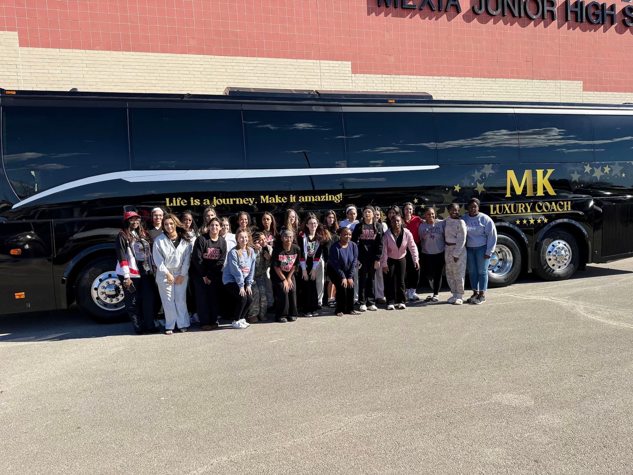 MK Luxury Coach full-size motor coach — professional group charter transportation Texas
